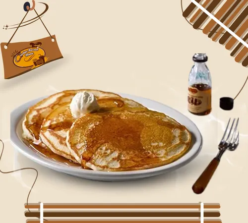 Cracker Barrel buttermilk pancakes with syrup drizzle