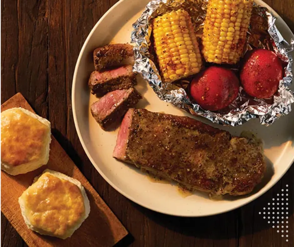 Cracker Barrel campfire steak lunch with corn and red potatoes